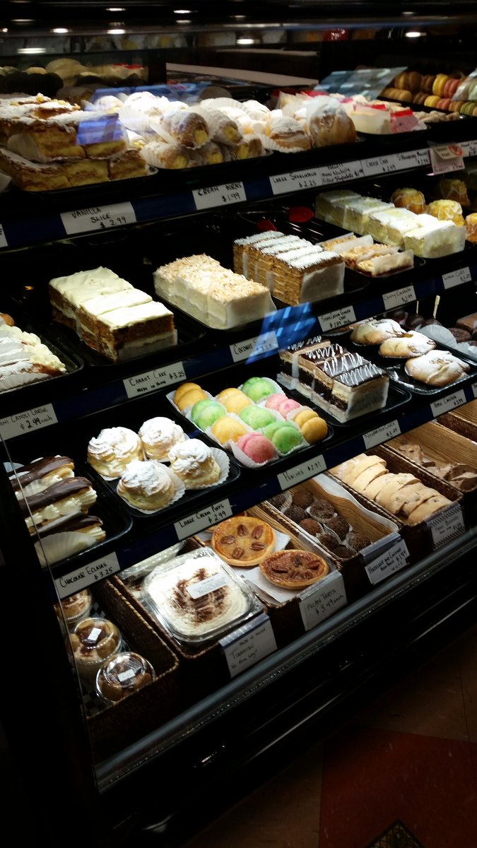 Our pastry counter is full! #coconutslice #carrotcake #sourcreamgingercake #neopolitancake #chocolatebrownie #lemoncake #ohmy