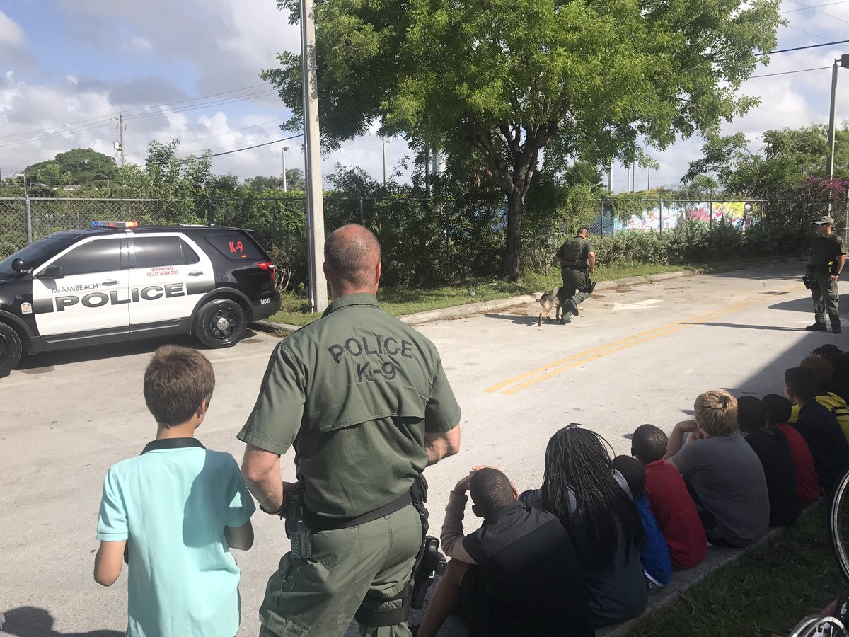 MiamiBeachPD's tweet photo. Happening Now: MBPD K9 Officers doing a demo for a group of homeless kids @ChapmanPartner. #MBPDcares https://t.co/V8HyN0CP3a