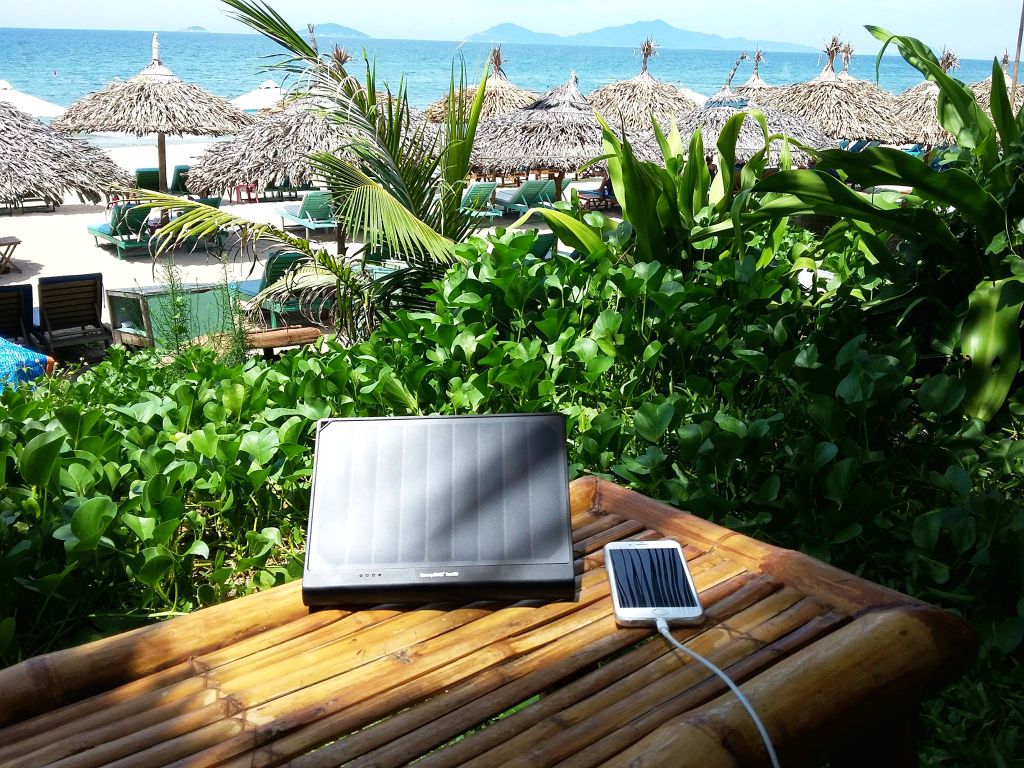 SunnyBAG1's tweet photo. Thank you Robert Ka for sending us this amazing picture of your #SunnyBAG #PowerTAB charging your phone with #solarpower in #Vietnam. https://t.co/UBSBKAFix6