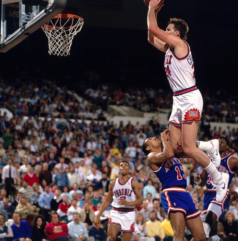 NBAbrds's tweet photo. Suns power foward Tom Chambers spreading his wings to dunk over Knicks guard Mark Jackson. https://t.co/Llnn0RGhwR