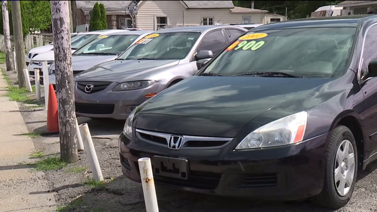 Authorities are raiding three car dealerships in Indianapolis including