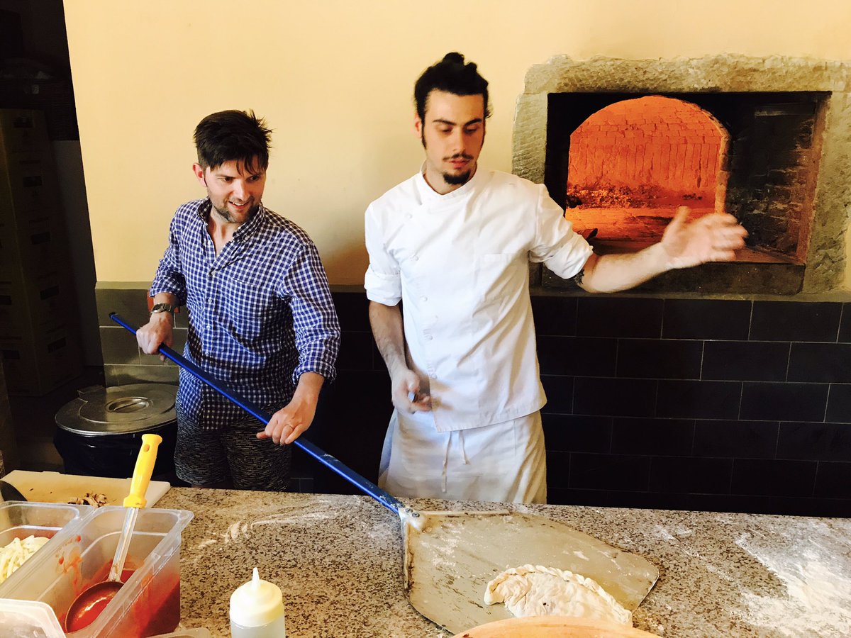 mradamscott's tweet image. As fate would have it, my pizza-making class in Italy goes awry, so the chef saves me by turning it into a calzone.