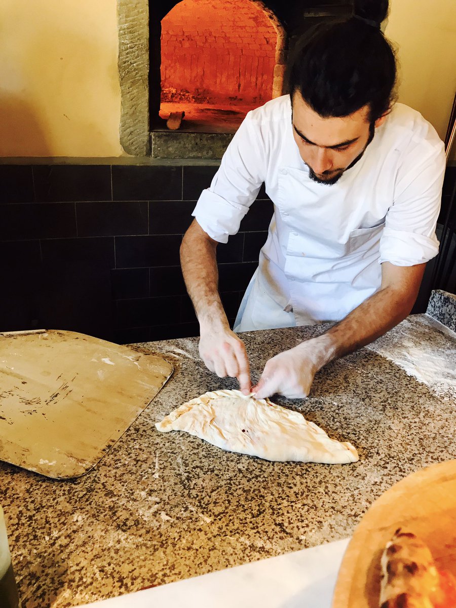 mradamscott's tweet image. As fate would have it, my pizza-making class in Italy goes awry, so the chef saves me by turning it into a calzone.