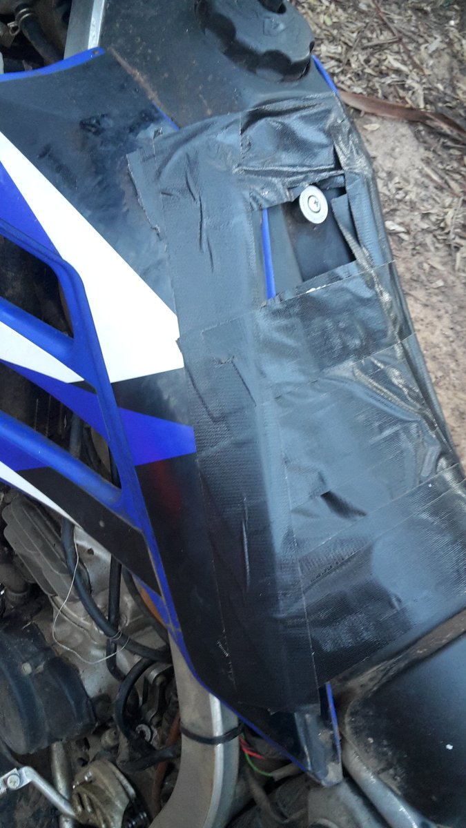 CallanDouglas's tweet photo. No bolts? No worries. A bit of tape and cable tie will fix it! #broken #tapedup #stuckon #bushmechanic 😂 https://t.co/uHvqOcn4ZP