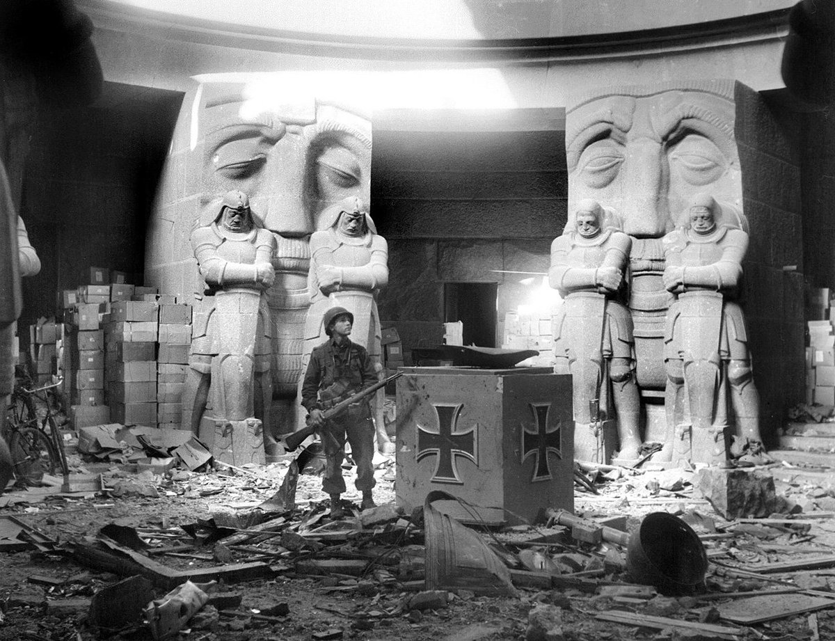 HowThingsWere's tweet image. American soldier standing in the ruined Monument to the Battle of Nations in Leipzig, Germany (1945)