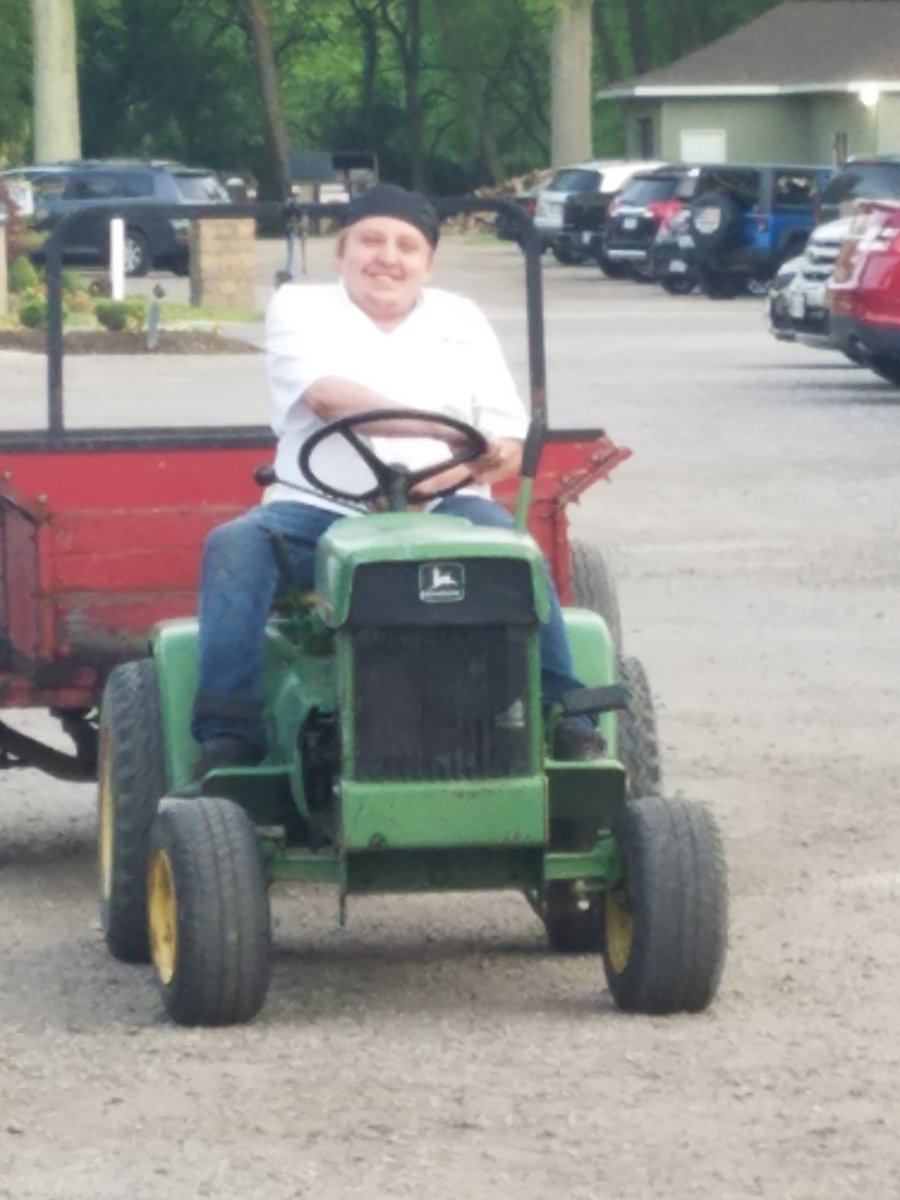 CrosswindGrille's tweet photo. it's not often you see a chef on a tractor!! #locallyunique.  With the georgous weather we will be open all day. Come enjoy our patios. https://t.co/FK89dvkUOv