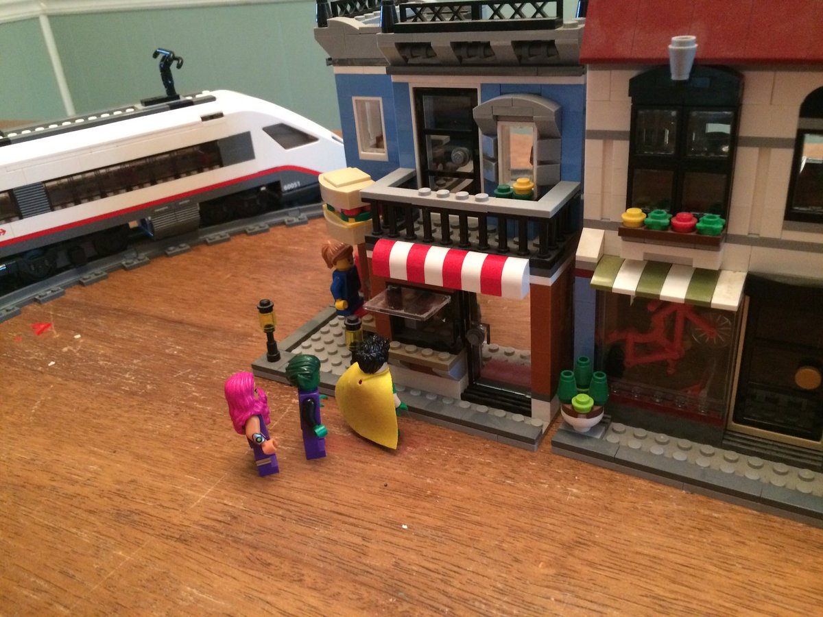 Nicktwelch's tweet image. My daughter wanted the Teen Titans to try the food from the corner deli. @LEGO_Group #funwithlegos