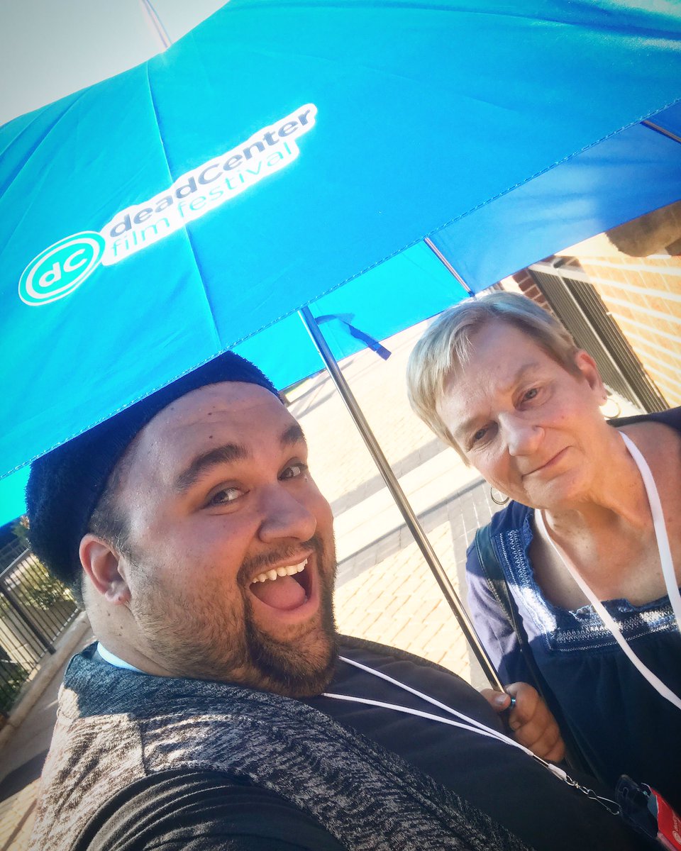 boo_kay's tweet photo. You know what's awesome? These kick ass umbrella-ella-ellas provided by @deadcenter Best way to beat the heat! #deadcenter #dcff17 https://t.co/xMs9lzrM2O