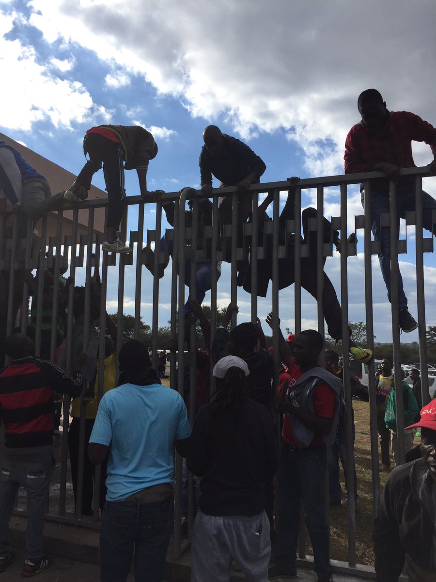 tatendamashanda's tweet photo. I have to admit that's how I got into the stadium too and saved $3 for transport this week #ZimLib https://t.co/RSr6y86Boa