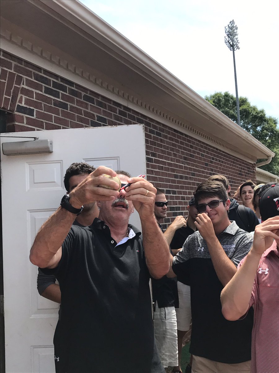 mlananna's tweet photo. Back at Wilson Field at Davidson, coach Dick Cooke addressed his players one last time--and showed them the proper way to sign a baseball. https://t.co/bfoq5oejvv