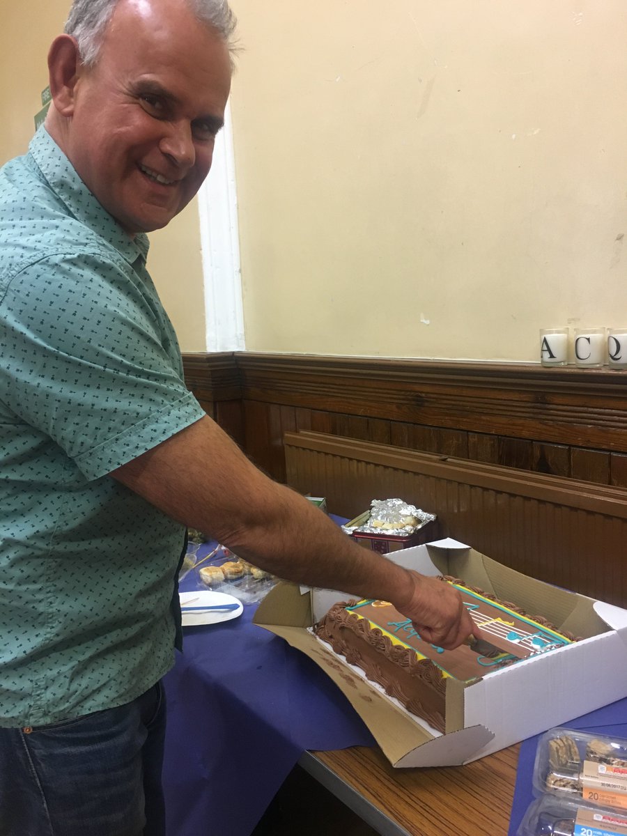 Acquire_Choir's tweet image. A week early! 
Happy birthday Acquire. 
Here's our Chair, Graham, cutting our birthday cake.