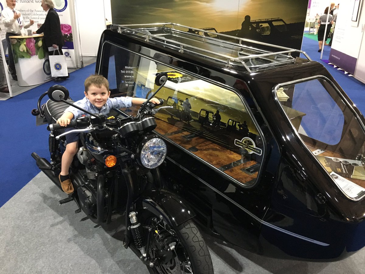 PeterEvansFD's tweet photo. Visited the @Funeral_Exhibit Family Day today, even Del Boy showed up! Not quite sure what to make of the electric blue Tesla hearse though. https://t.co/UNJMPf1cFr