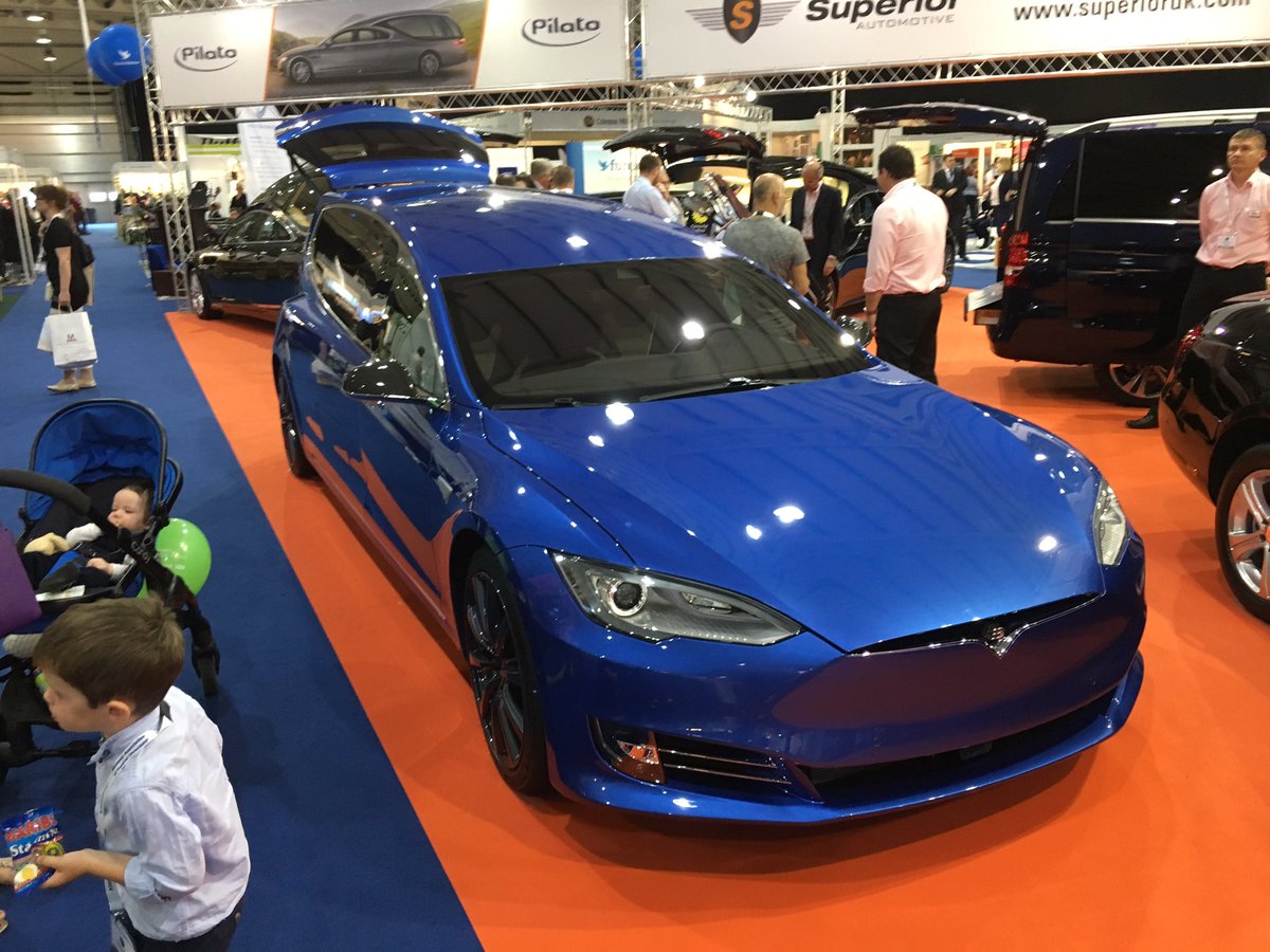 PeterEvansFD's tweet photo. Visited the @Funeral_Exhibit Family Day today, even Del Boy showed up! Not quite sure what to make of the electric blue Tesla hearse though. https://t.co/UNJMPf1cFr