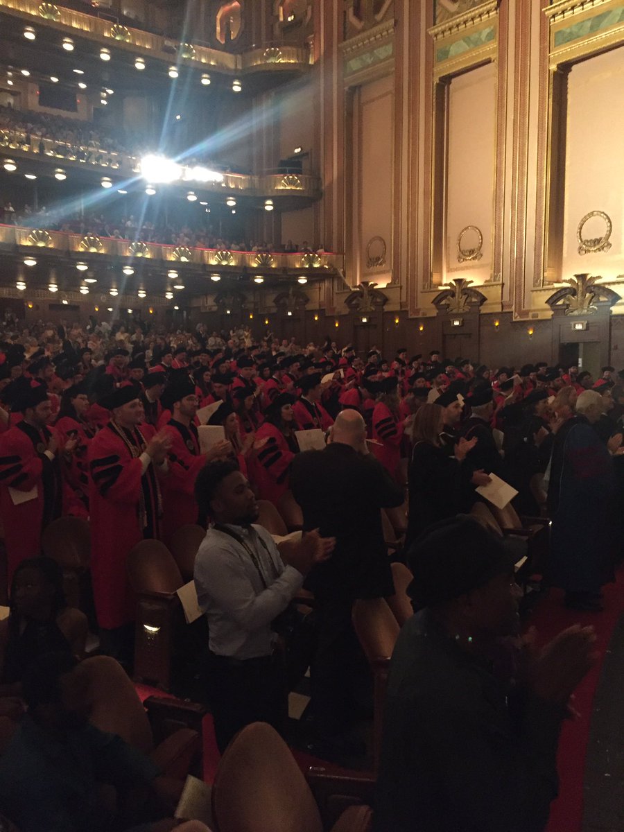 uiclaw's tweet photo. Senate Durbin receives a standing ovation for his commencement address. #JmlsGrad https://t.co/9IogjNPk7k