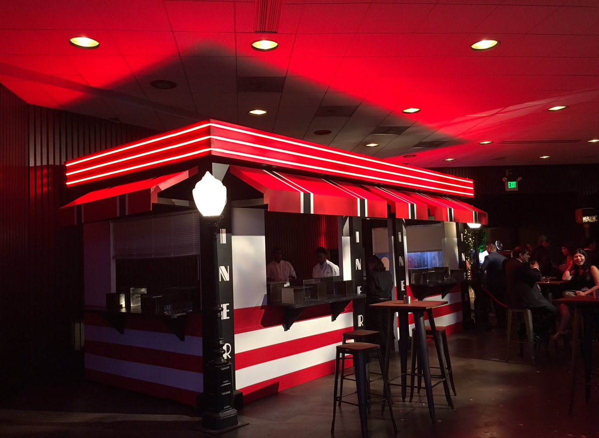 A very red (Netflix red?) diner at the #netflix100Mparty