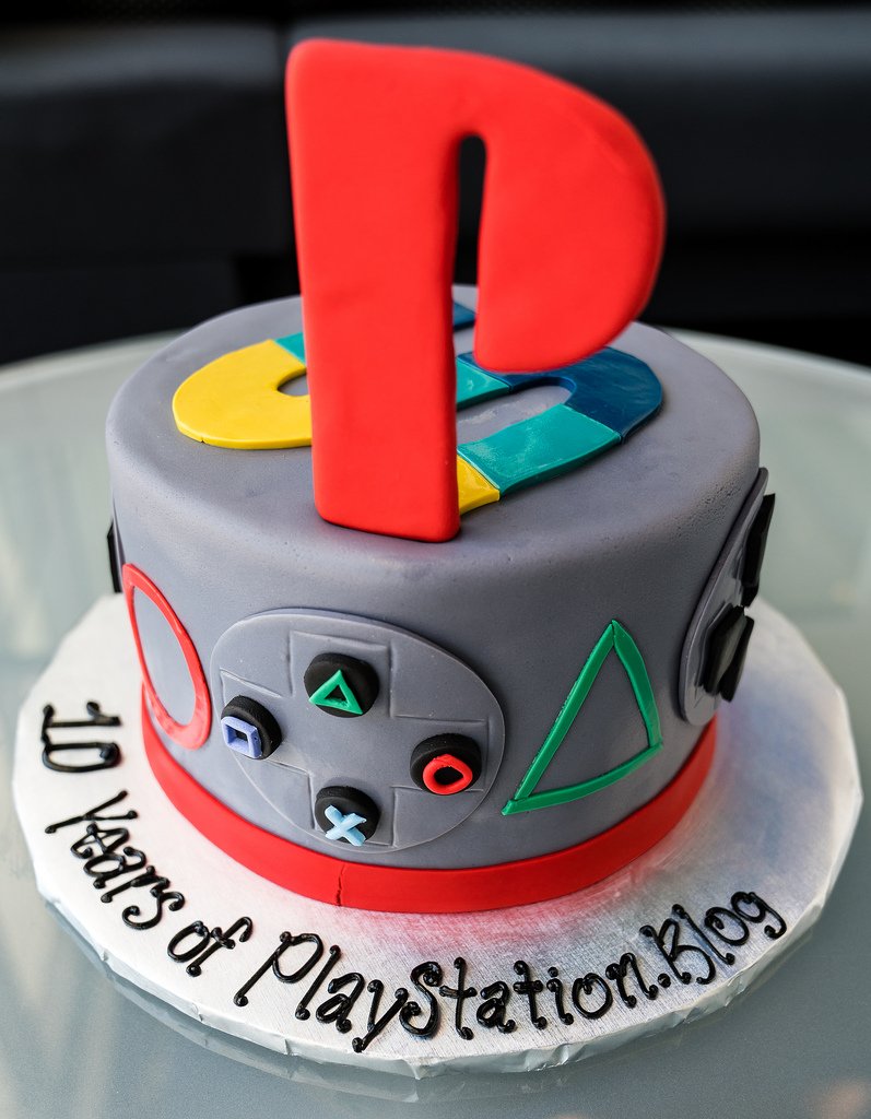 PlayStation's tweet photo. https://t.co/6rfZPfxTMf turned 10 today! https://t.co/bY0cwvdECT Of *course* we celebrated the day with a custom cake https://t.co/2rR9ZUeYw9