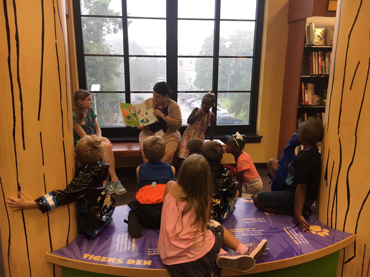 chseproed's tweet photo. First day of the Tiger Tales Literacy Camp is a rainy one but surely fun!! Ms. Decuir is reading to the kids at the LSU bookstore https://t.co/WvWRKjh0OC