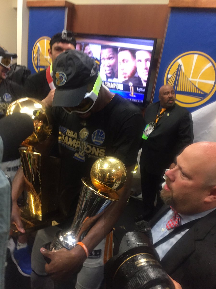 warriors's tweet photo. How's it feel KD?! 🏆🍾 https://t.co/aTRgu81XtS