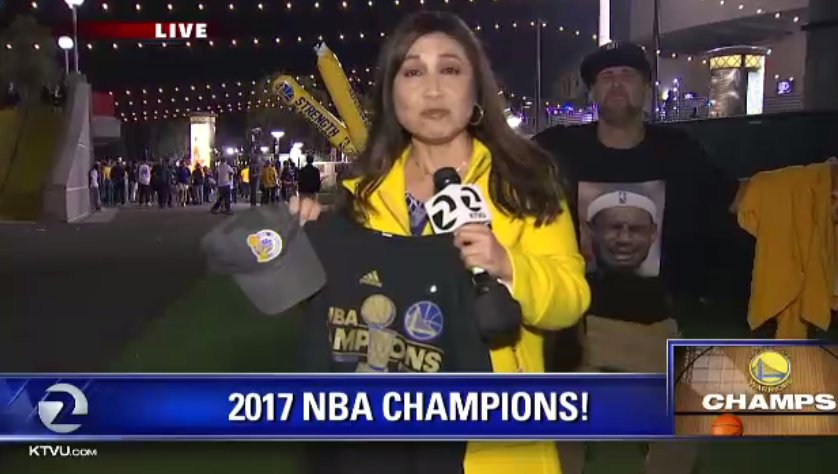 KenWayne's tweet photo. .@AmberKTVU photo bombed by #Warriors fan in #CryingLebron T-shirt. https://t.co/vJusuchain