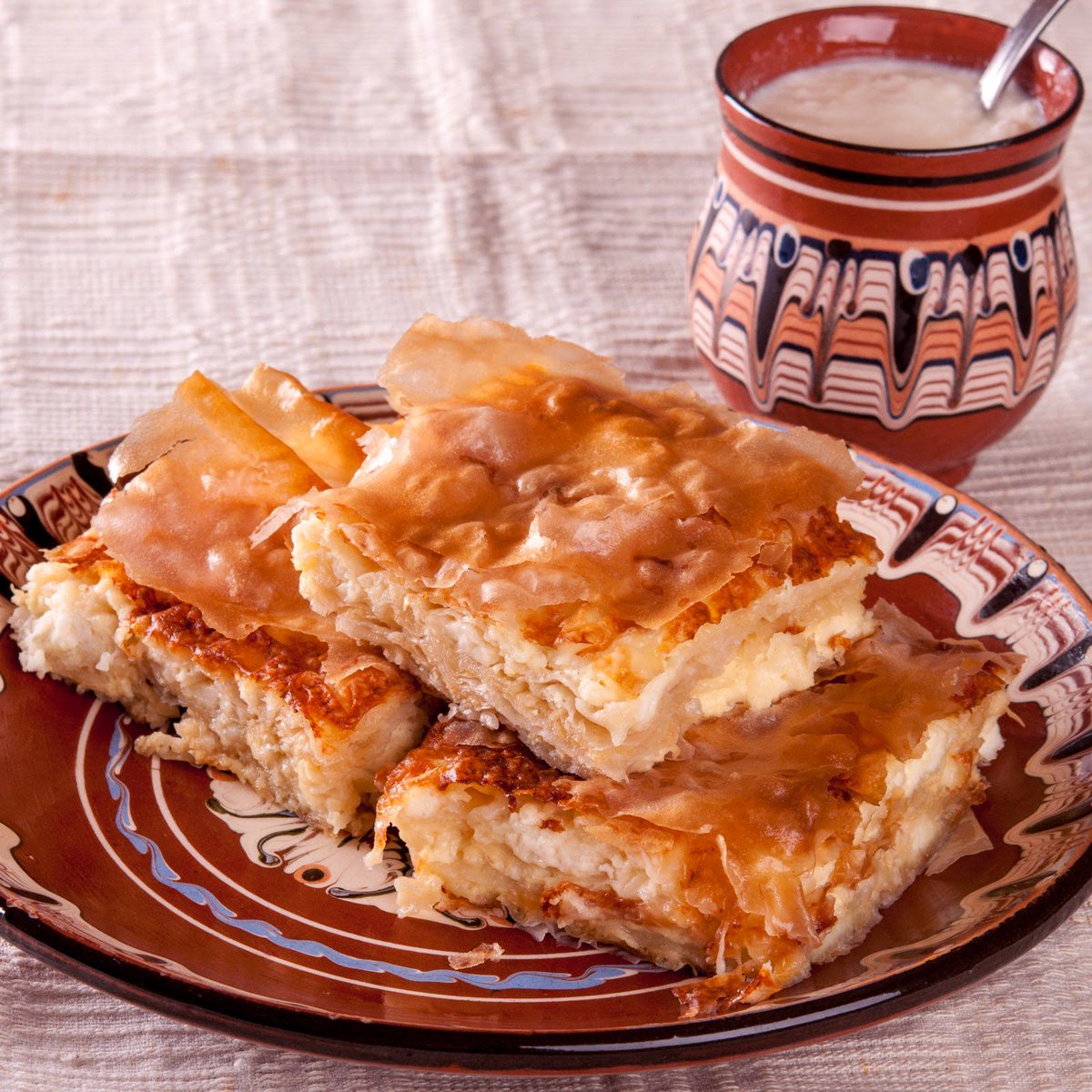 StyleSecession's tweet image. Banitsa is a traditional Bulgarian food eaten for breakfast, prepared by eggs and pieces of cheese between pastry, baking it in an oven.