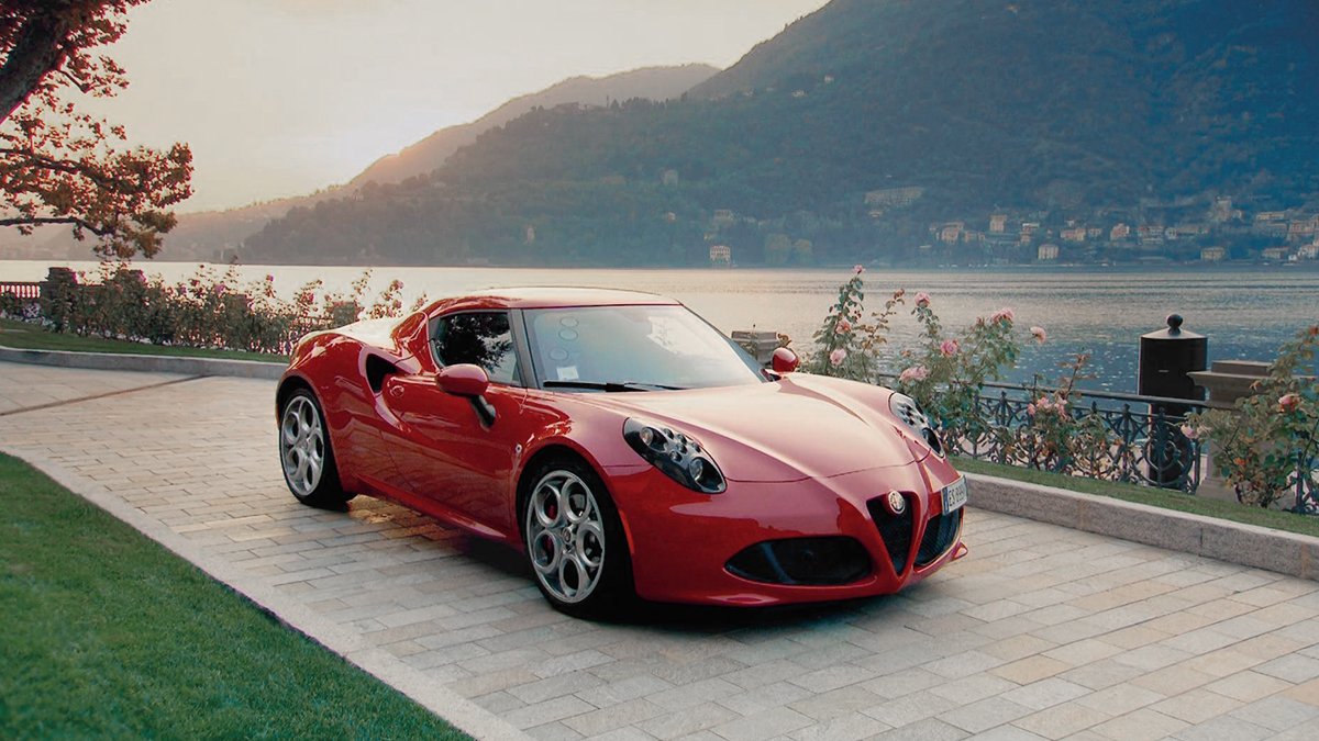 alfa_romeo's tweet photo. "Supercar" or "Supermodel"? #4C really knows how to strike a pose: thanks to @hsashkov! Share more with #AlfaLovers. https://t.co/bXsVxT9UbF