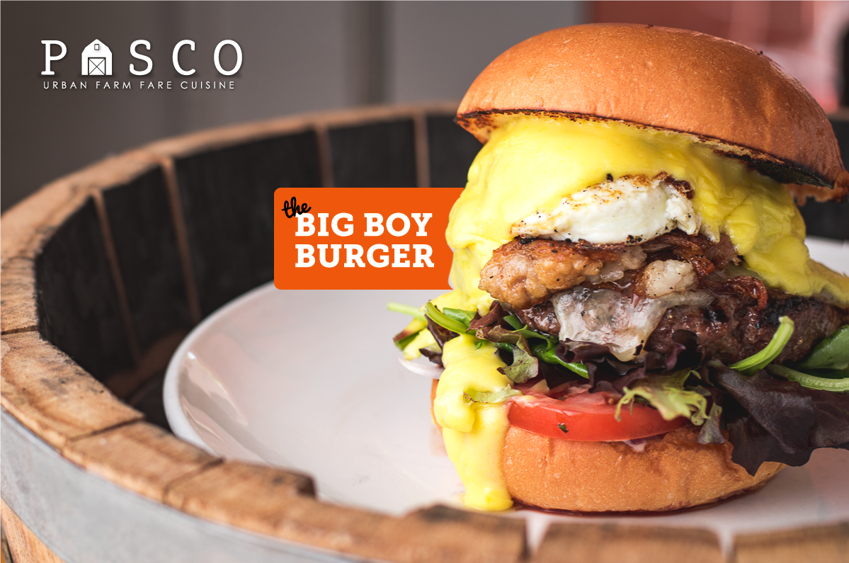 The Big Boy Burger is stacked with a grass-fed beef patty, 12-hour braised pork belly, a fried egg, and house made Hollandaise. #burger