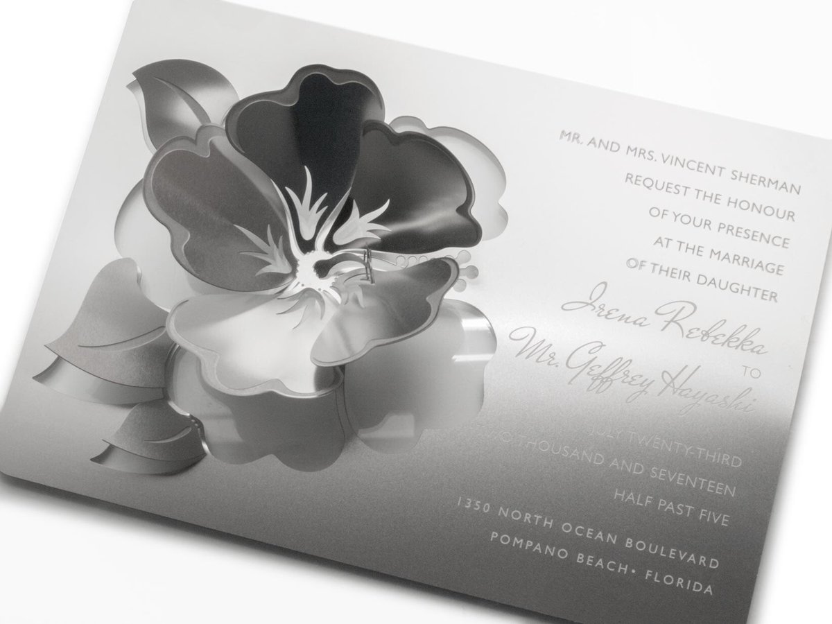 Or latest metal invitation features a sculpted hibiscus! #weddinginvitation #modernwedding