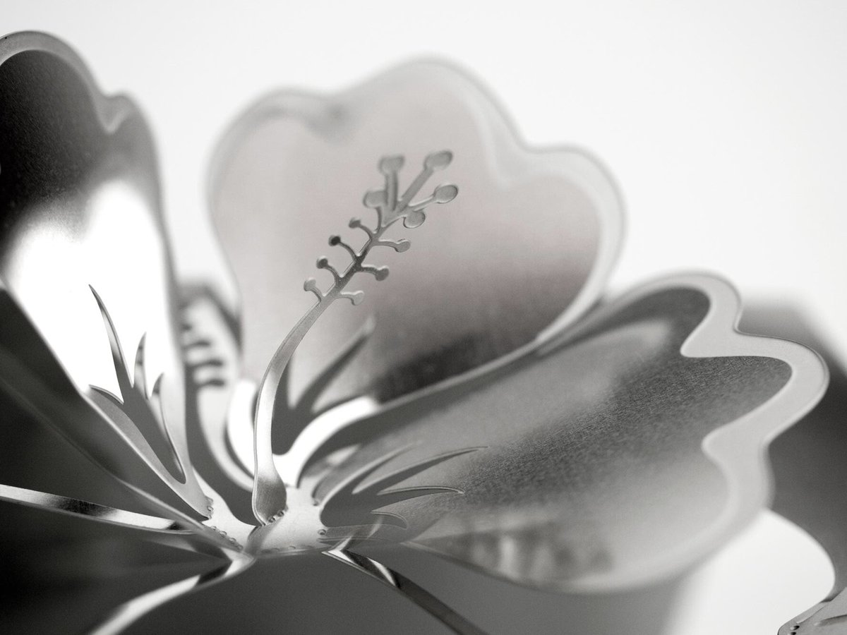 Detail shot of our sculpted hibiscus metal invitation! #weddinginvitation #modernwedding