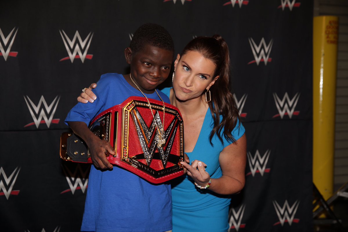 StephMcMahon's tweet photo. Who's the man? @Jarrius! Congratulations on receiving this #WWEHero customized championship for your courage, perseverance &amp; helping others! https://t.co/5mZ2ERgylo
