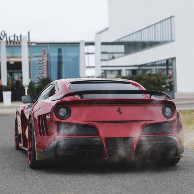 billionnaires's tweet photo. Burgundy Ferrari F12 N-Largo https://t.co/f1tnlvC7WG