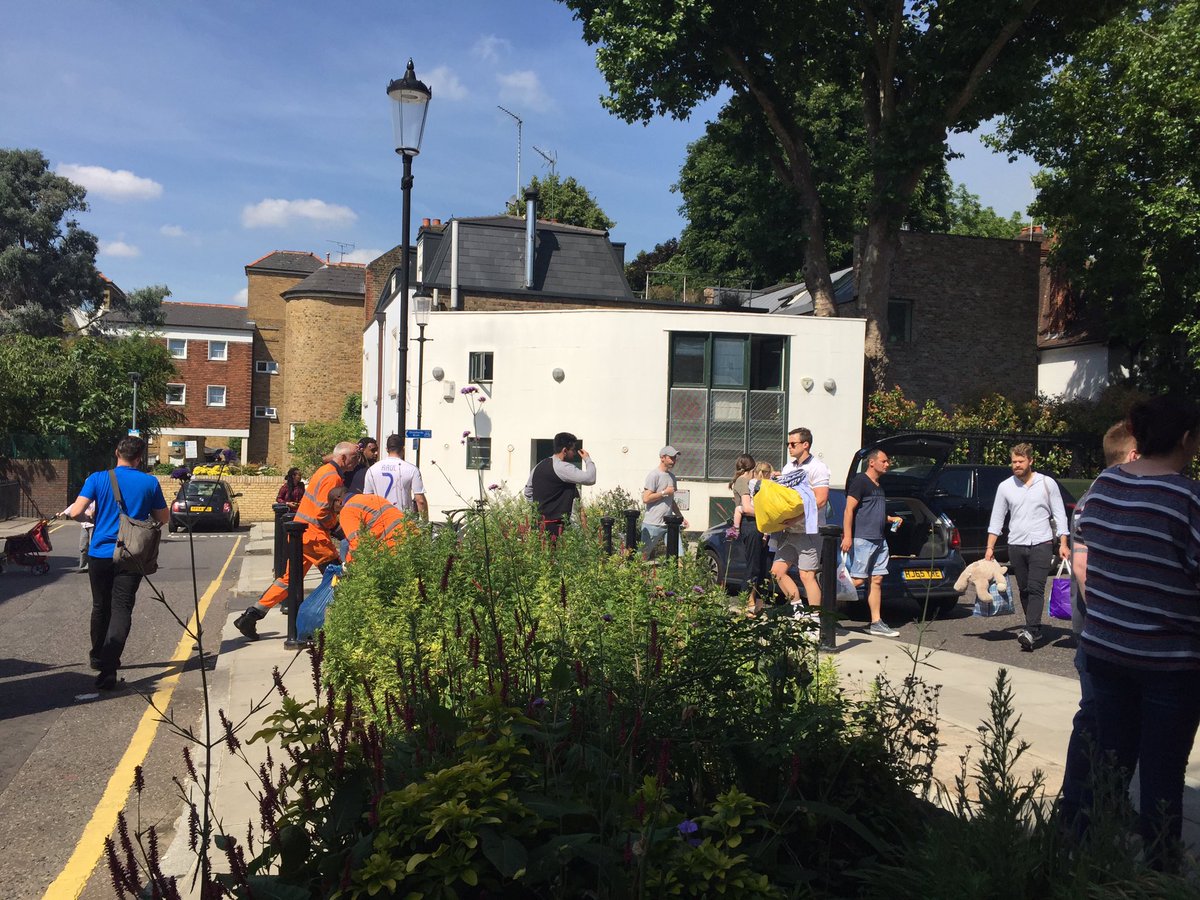 heliaebrahimi's tweet image. The scene in Notting Hill as people go 2local churches 2donate. One woman had a bin bag +a teddy bear #GrenfallFire