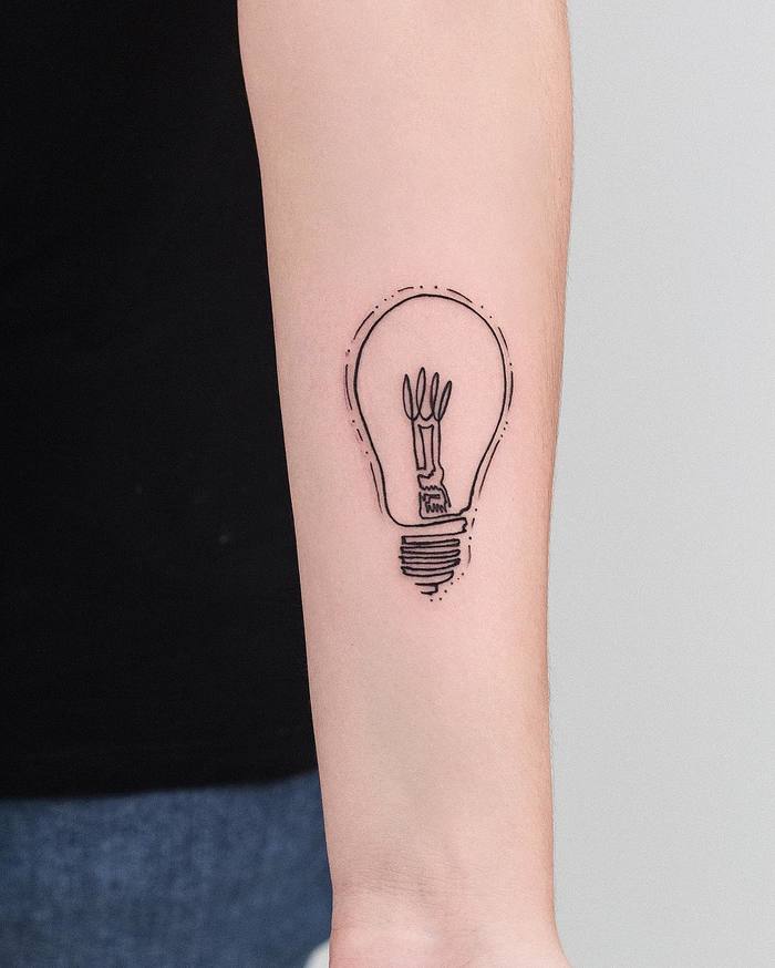 Light bulb tattoo and art nouveau flowers t-shirt design. Symbol of the  idea, creativity, creative, imagination, freedom. Tattoo light bulb Stock  Vector | Adobe Stock