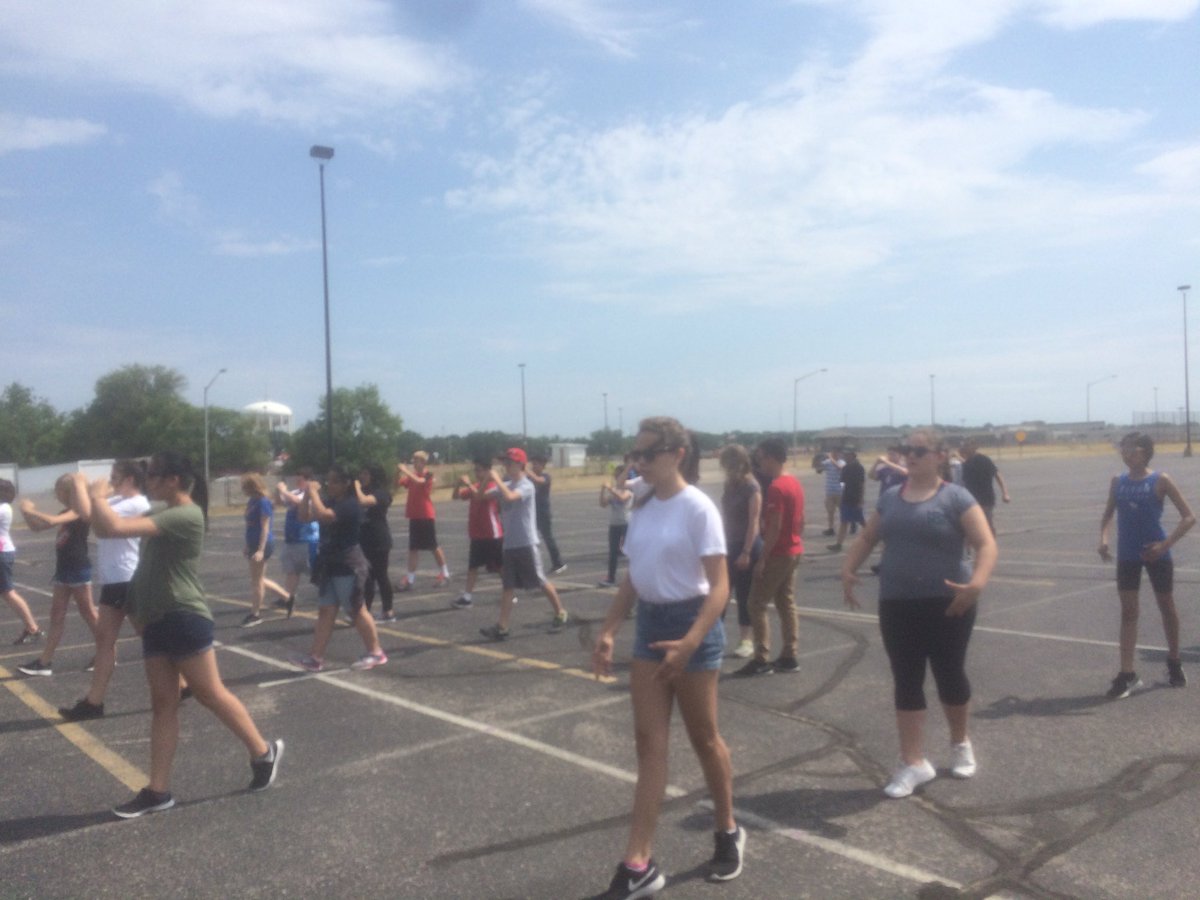 WyomingWolves's tweet photo. One of the best bands in Michigan! Doing work during a hot day at the High School. https://t.co/mxOIbDRJD1