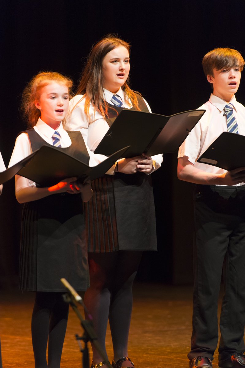 OBAMusicArt's tweet photo. Here's two of our soloists from Year 11 - Chelsea and Brian - singing with Mia from Year 9, who were all featured as soloists! #OBAMusic https://t.co/nrHw3PgKWa