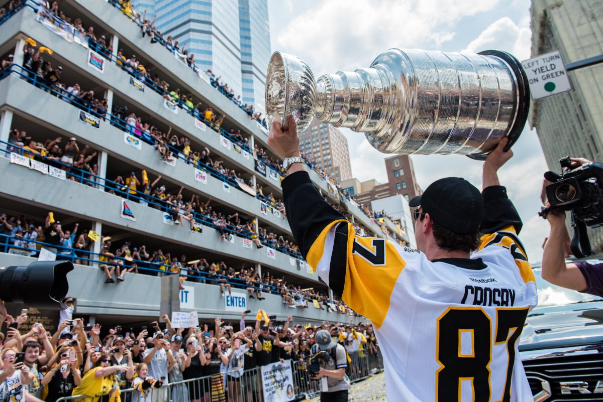 DaveDiCello's tweet photo. Sid presenting the Stanley Cup to the garage on the Boulevard everything.  What an amazing experience today. https://t.co/vSIjbndmDe