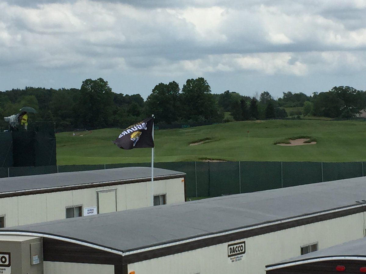 BenVolin's tweet photo. A Jacksonville Jaguars flag is waving proudly at the US Open in Wisconsin, for some reason https://t.co/FnU4KrnOdz