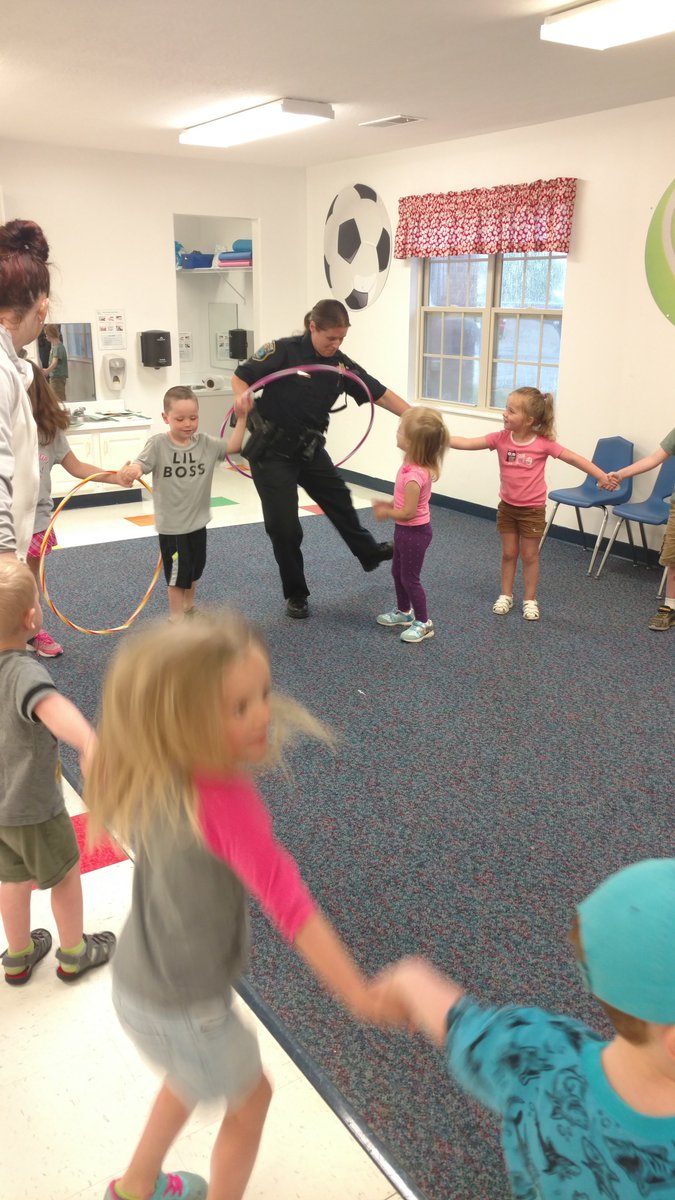 HamiltonTwpPD's tweet photo. Ofc. Wall &amp; Workman hanging out @RainbowCCC today reading books and having fun! https://t.co/6YOQGgaoYc