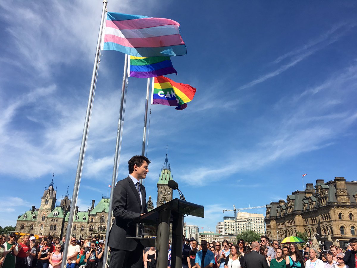 R_Boissonnault's tweet photo. So proud to join @JustinTrudeau, as we raise the trans flag for the first time on Parliament hill! #Pride #LGBTQ2 https://t.co/anzLT7lZvU