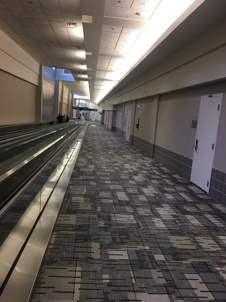 runbroe's tweet image. When there's a long, sloping hall at the airport and you just want to do strides...#runnerproblems