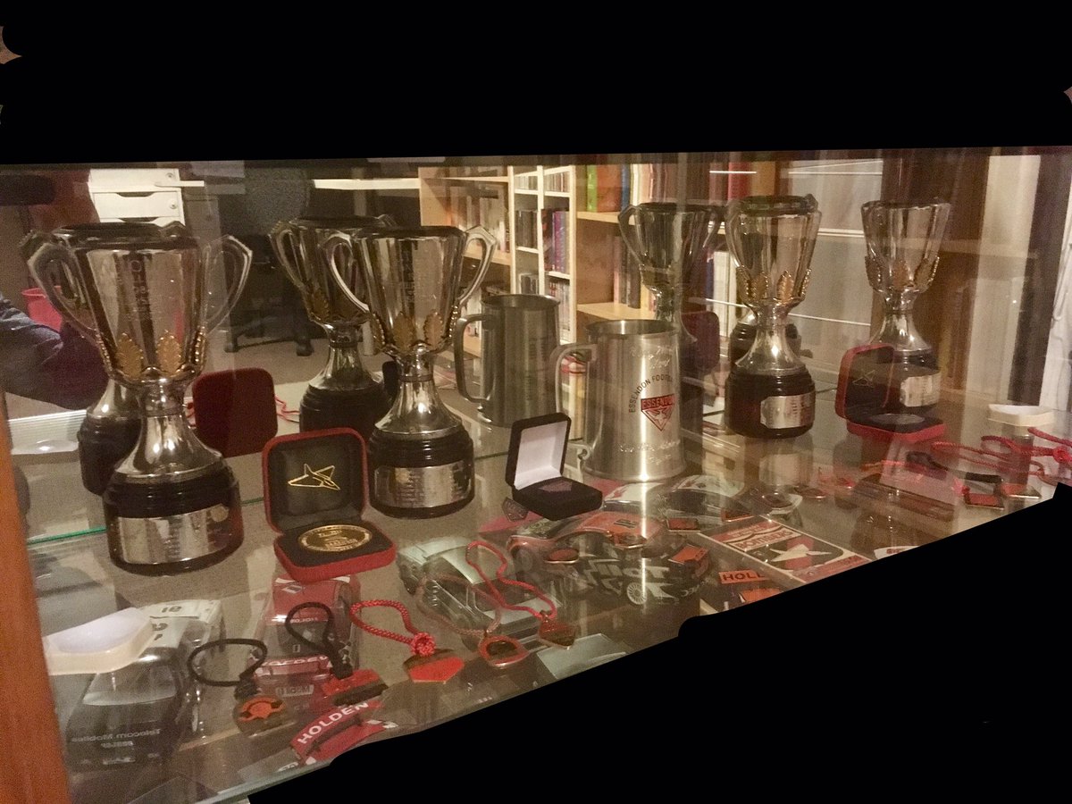 Kernal81's tweet photo. @EssendonFC replica premiership cups from my lifetime. Various membership medallions from 70s & 80s. 1996 stamp set. #DonComp https://t.co/LVEg1a22qk