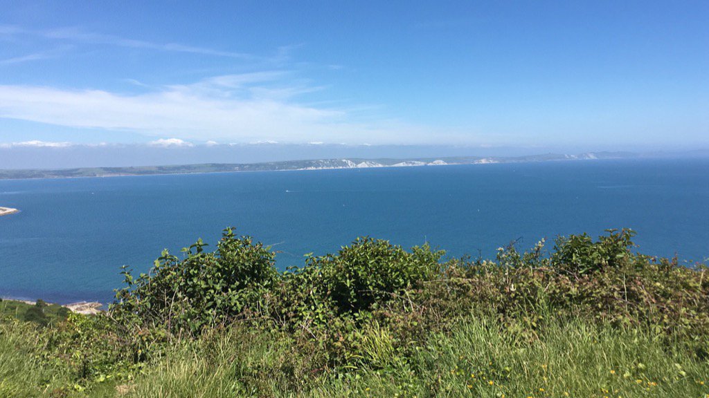RMonk2's tweet photo. @countrywalking we did a leg of the @swcoastpath at Portland this week- here's a pic of the blue skies and bluer sea! https://t.co/bjRL1qm2CC