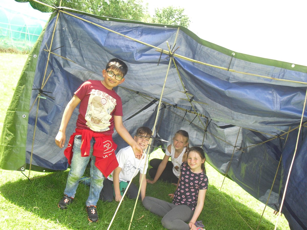 Tarp tug-o-war with today's winds!  #Year5 loved #DenBuilding!