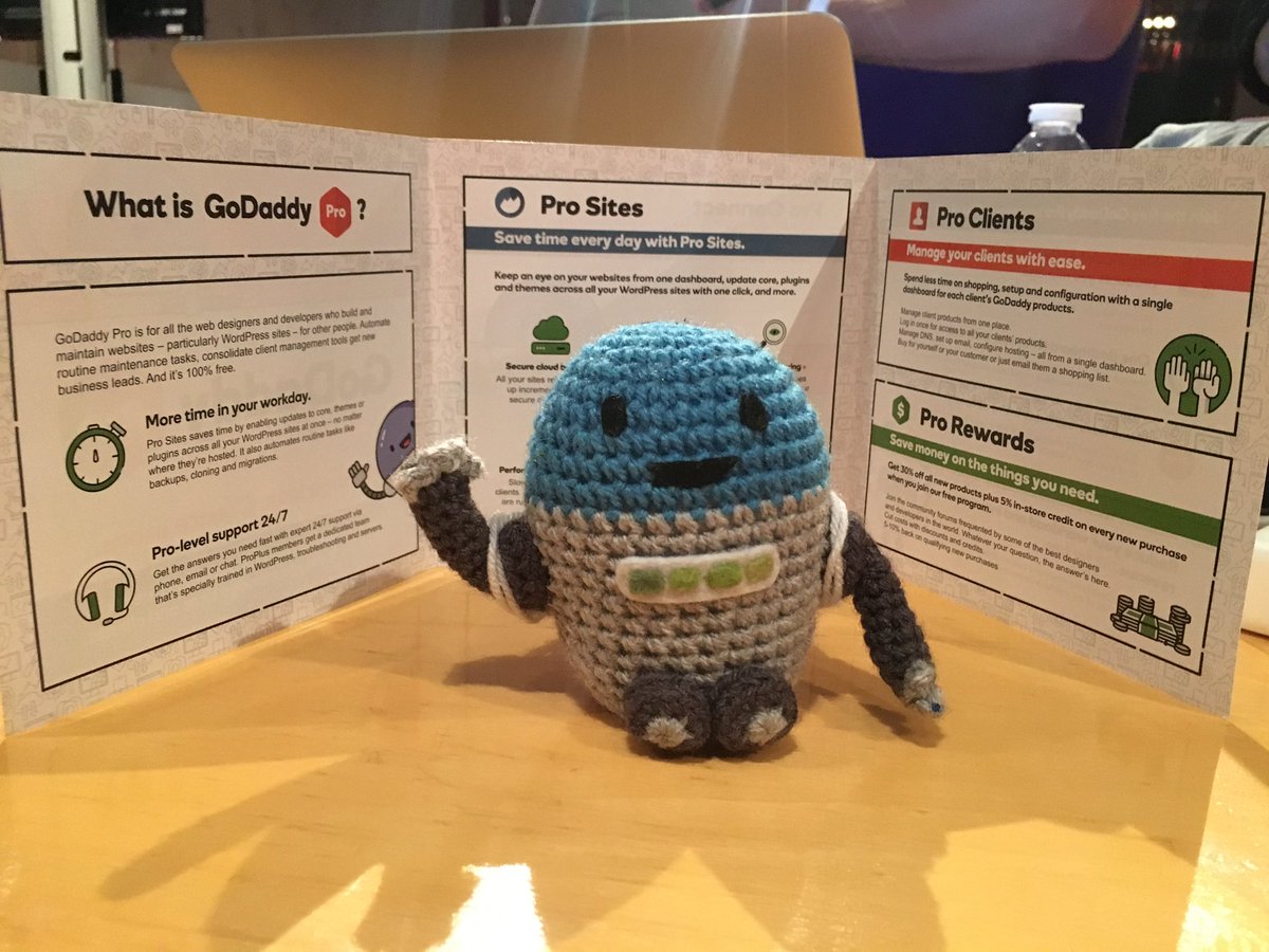 manny's tweet photo. Surrounded by @GoDaddy and @managewp Join me and grab some swag #wceu https://t.co/tC9dWB0x4R