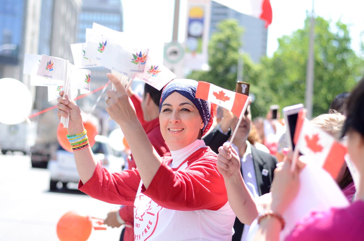 unpackmag's tweet photo. #CanadaDay started early at @iwchamilton. Newcomers gathered to celebrate yesterday in #HamOnt: https://t.co/1iazUrKEkQ #Canada150 https://t.co/UBFlyohXLa