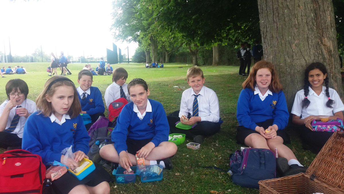 PiggottLibrary's tweet image. Book Club outside today in the lovely warm weather. Recommending books and planning our end of year picnic.