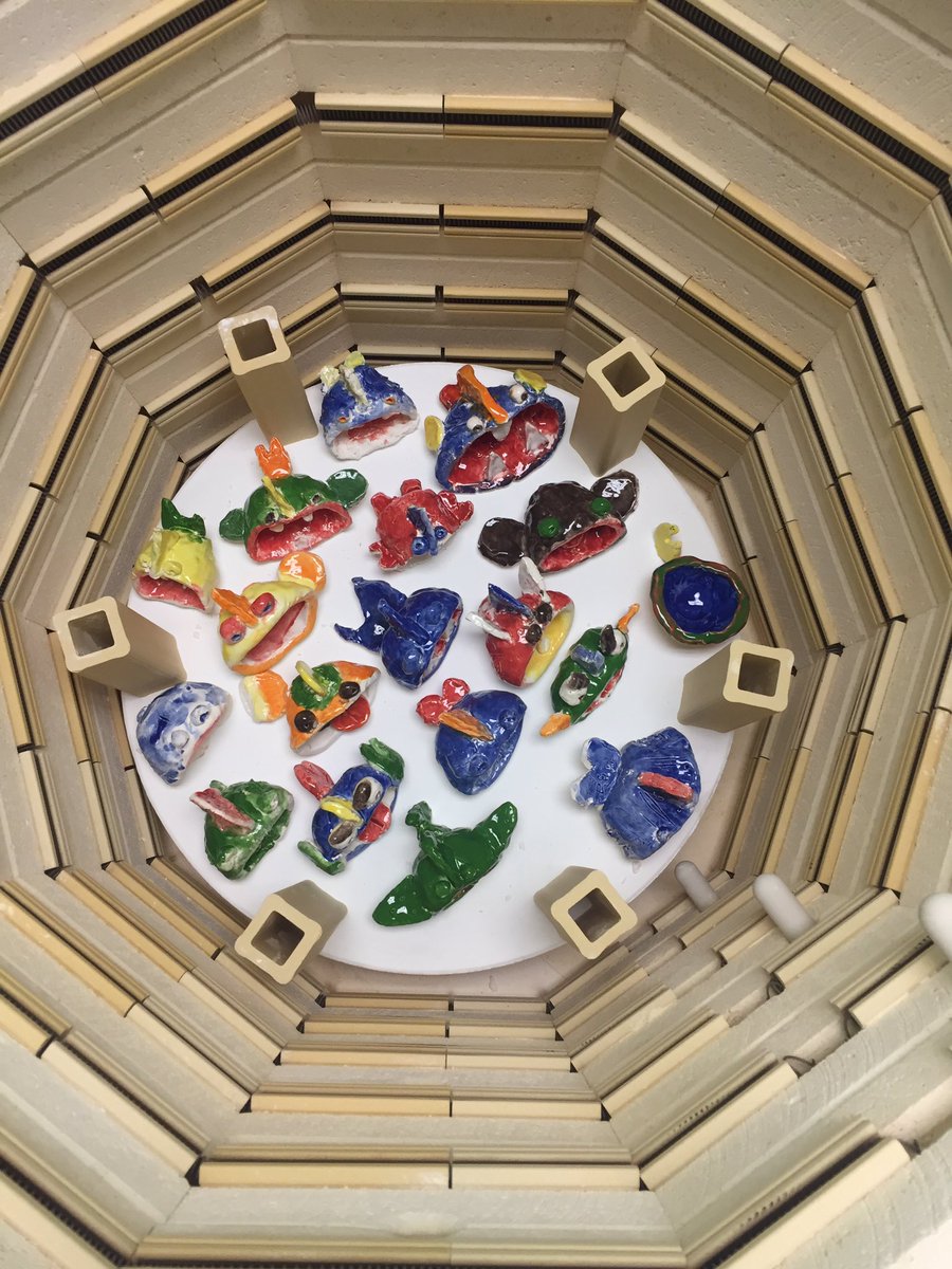 Every layer of the kiln is looking gorgeous this morning! 1G: flowers, K: pinch pots &amp; 2G: fish