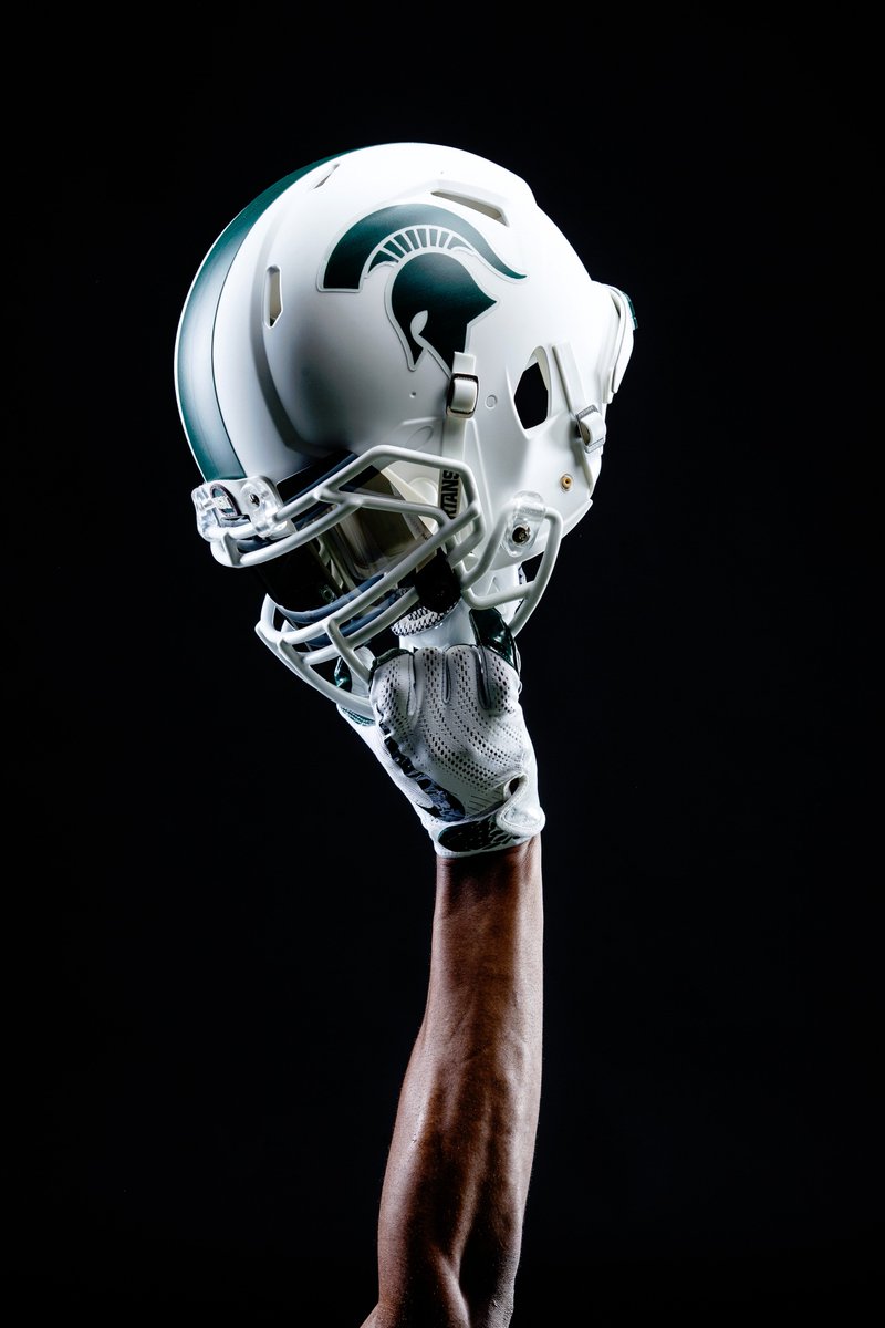 MSU_Football's tweet photo. And here are a few more pics of the new helmets and all-white uniform combo! https://t.co/ZLa9hWvOlI