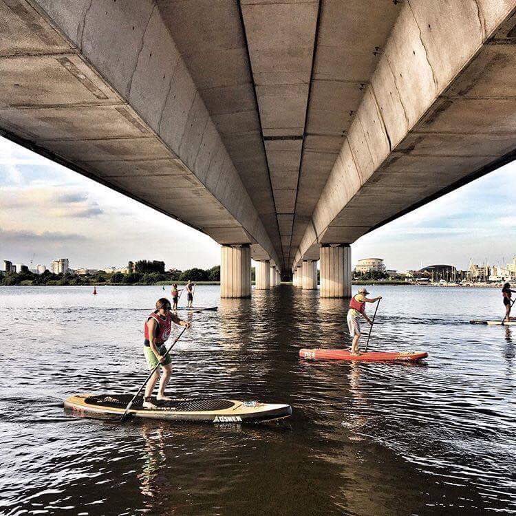 SeekAdv's tweet photo. The 'post-work paddle' 👌 Picture shamelessly stolen from the guys who got me back on the board! #waterskillsacademy @cardiffintww https://t.co/EsBmApV6rb