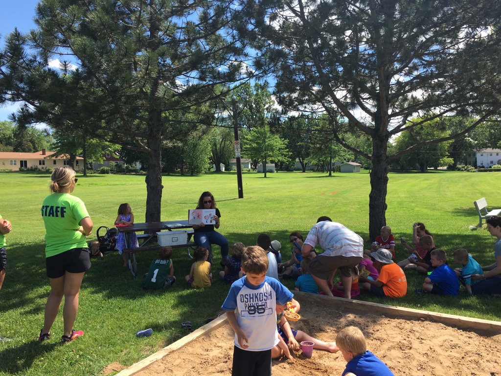 MrsKnetter210's tweet photo. @MissMenneWDP is reading to the students who stopped at Patriot Park. Remember we're here every Thurs. from 2-3pm. https://t.co/wlfHY7zpnu