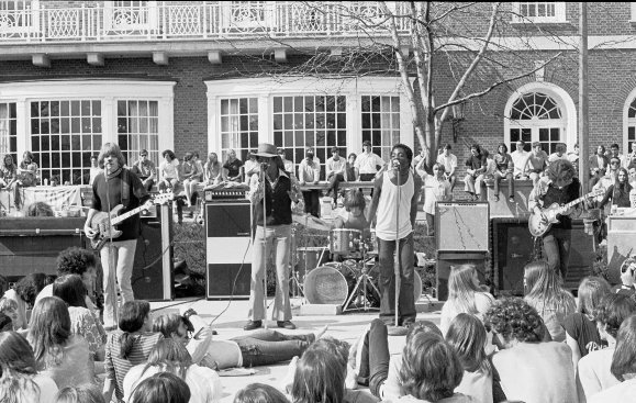 NextTierEdu's tweet photo. #FeatherTrain plays on the #Quad at @Illinois_Alma in 1970. Members of the band would later join #Champaign's #ReoSpeedwagon. #TBT https://t.co/rbHtzAst6g